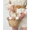 Rieten Handtas Pompoms beige witte bolletjes-rieten-riet-hantassen-beige-en-witte-bolletjes-lang-hengsels-strandtassen-kopen-bestellen-model 1