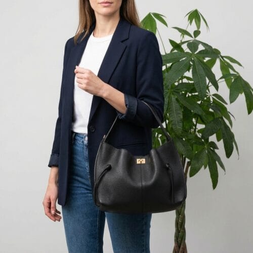 Leren Handtas Flora zwart zwarte leer bag in bag handtassen gouden draaislot chique dames tassen kopen model