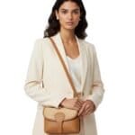 Leren Schoudertas Noa cognac raffia details leer schoudertassen chqiue goud beslag uniek kopen bestellen model 1