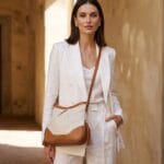 Leren Schoudertas Lana fringe beige met cognac details tweekleurig leren schoudertas trendy boho leer italiaans dames kopen bestellen model